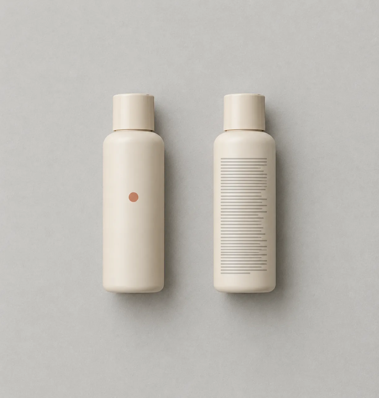 Two identical unbranded bottles: one face up with a nearly empty front, one turned over showing dense fine print.